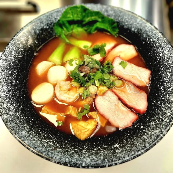Noodle 501's noodle soup with char siu, shrimp, fish balls, bok choy, and cilantro.
