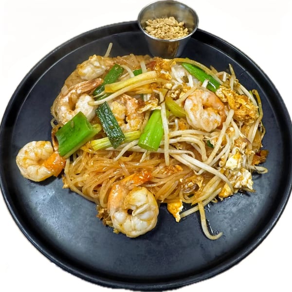 Noodle 501's shrimp Pad Thai with bean sprouts, green onions, and a side of crushed peanuts.